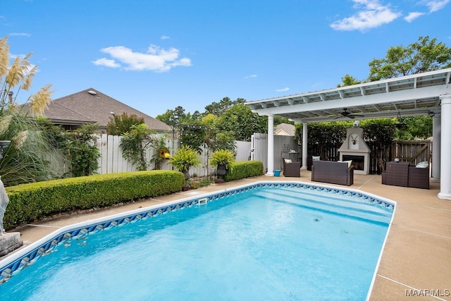 view of pool with a pergola and a patio area