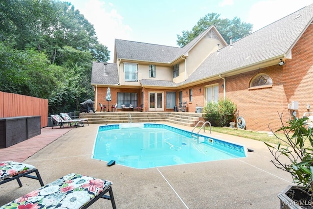 view of pool with a deck