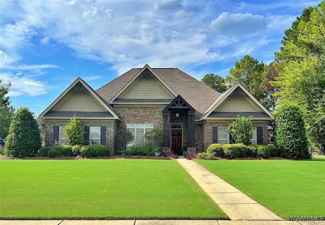 craftsman house featuring a front yard