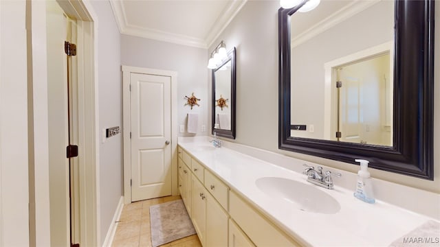 bathroom featuring tile patterned floors, vanity, and ornamental molding