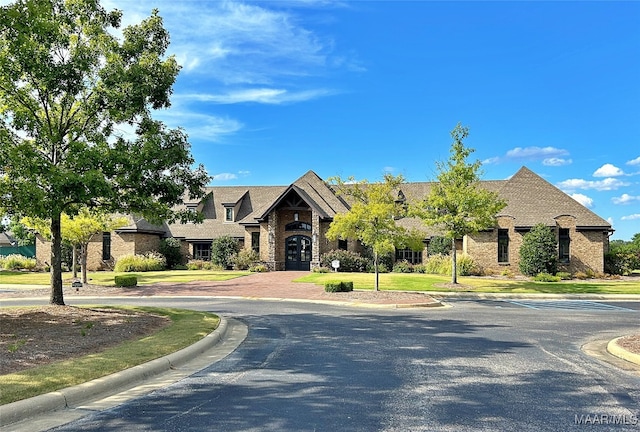 view of front of home featuring a front lawn