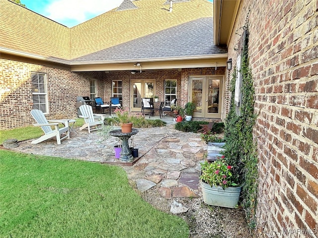 view of patio featuring french doors and ceiling fan