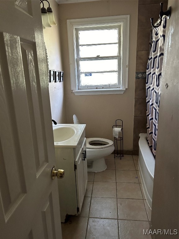 full bathroom with tile patterned flooring, vanity, toilet, and shower / bath combo