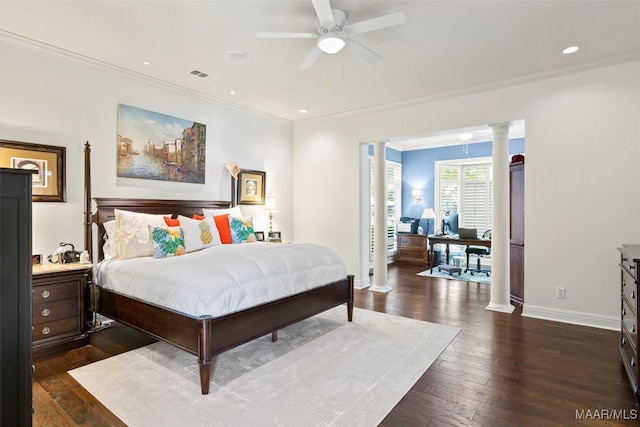 bedroom featuring crown molding, dark hardwood / wood-style flooring, ornate columns, and ceiling fan