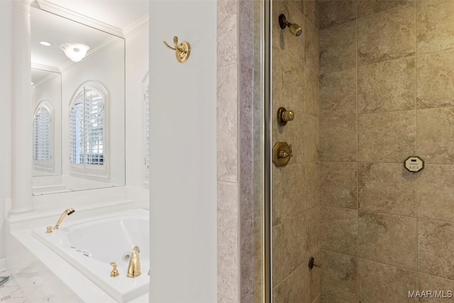 bathroom with crown molding and independent shower and bath