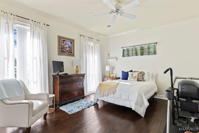 bedroom with ornamental molding, ceiling fan, and dark hardwood / wood-style floors