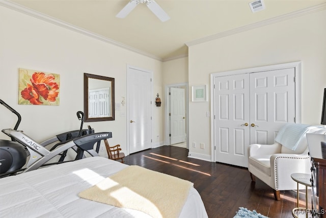 bedroom with ceiling fan, dark hardwood / wood-style flooring, and ornamental molding