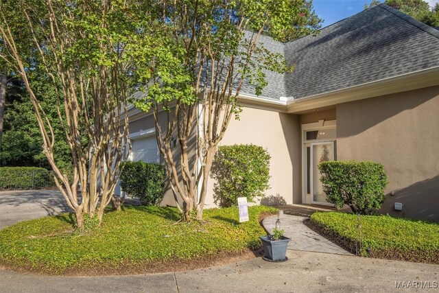 entrance to property featuring a garage