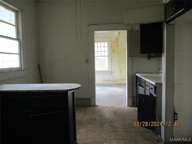 kitchen with concrete flooring