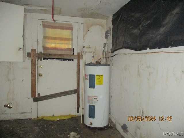 utility room featuring electric water heater