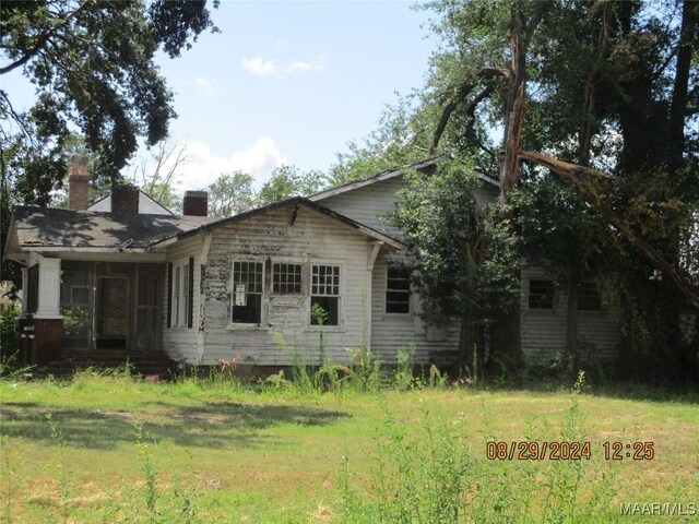 view of home's exterior featuring a yard