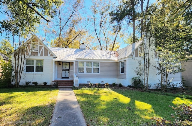 view of front of home with a front yard