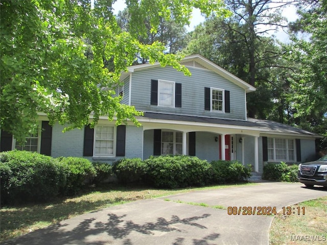 view of front of property with brick siding