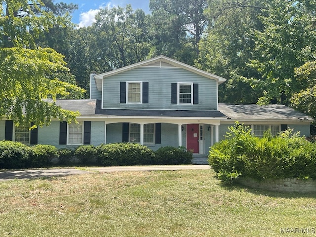 front facade with a front lawn