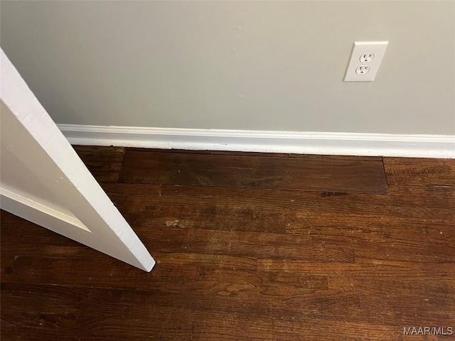 details with hardwood / wood-style flooring