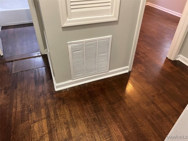 interior details with hardwood / wood-style flooring