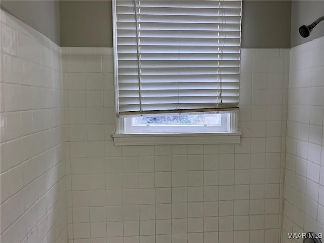 room details with a tile shower