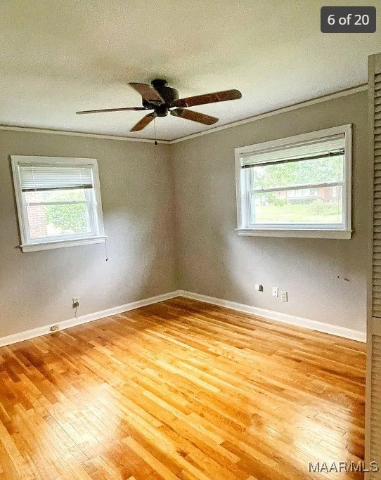 unfurnished room featuring crown molding, light hardwood / wood-style flooring, ceiling fan, and a textured ceiling