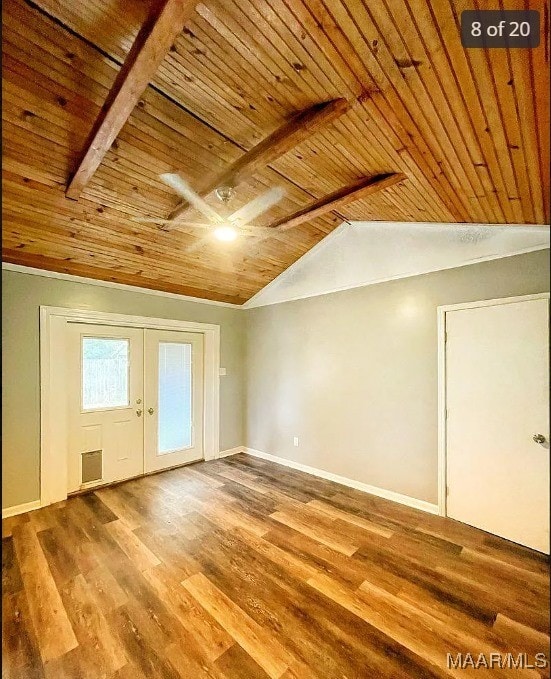 additional living space with wood ceiling, vaulted ceiling, and wood-type flooring