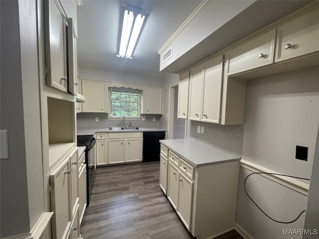 kitchen featuring crown molding, white cabinetry, sink, black appliances, and dark wood-type flooring