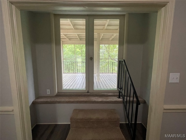 staircase with french doors