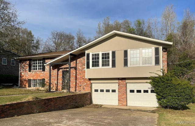 split foyer home featuring a garage