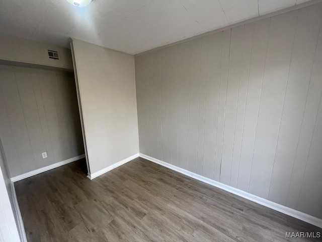 14 Azaleawood Dr, Wetumpka, AL 36093 - empty room featuring wood finished floors, baseboards, and wood walls