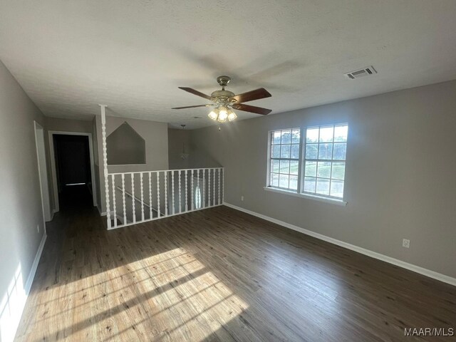 14 Azaleawood Dr, Wetumpka, AL 36093 - unfurnished room featuring ceiling fan, wood finished floors, and baseboards