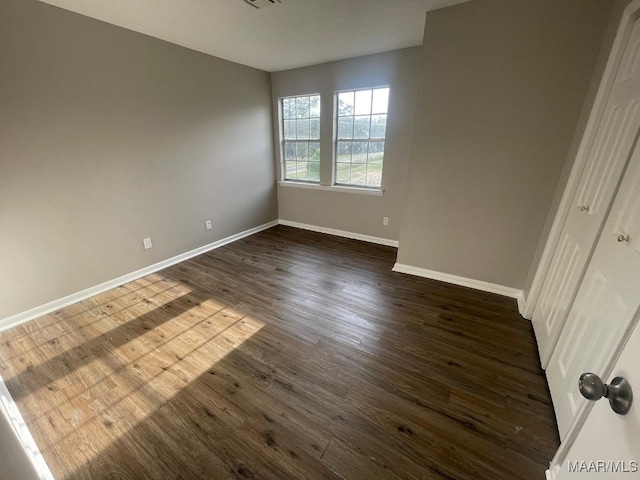 14 Azaleawood Dr, Wetumpka, AL 36093 - spare room featuring baseboards and dark wood-type flooring