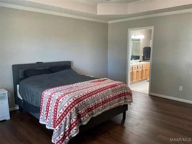 bedroom with connected bathroom, ornamental molding, and wood-type flooring