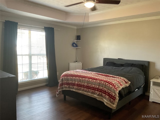 bedroom with crown molding, multiple windows, and dark wood-type flooring