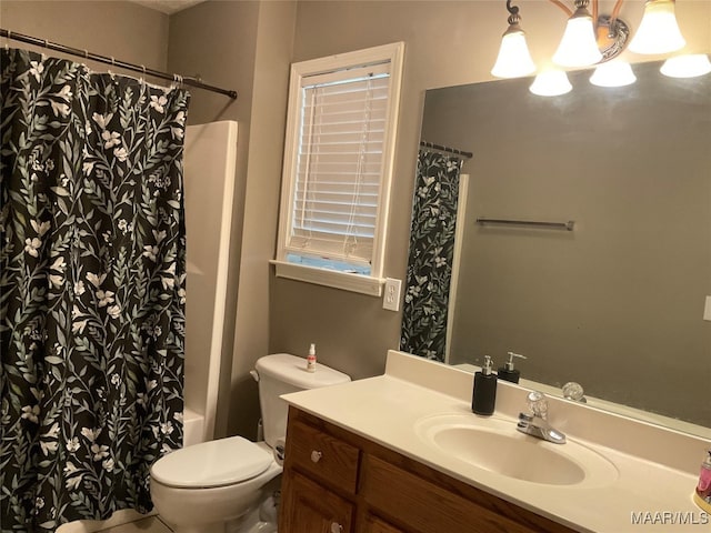 full bathroom with toilet, shower / tub combo with curtain, and vanity