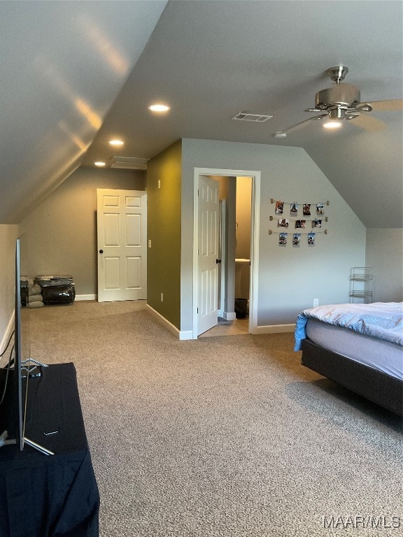 bedroom featuring ceiling fan, carpet, and vaulted ceiling