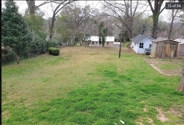 view of yard with a storage unit