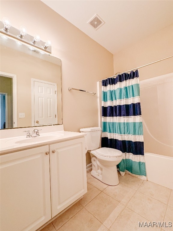 full bathroom with tile patterned flooring, vanity, toilet, and shower / bathtub combination with curtain