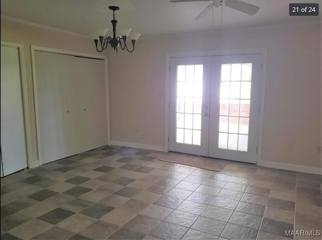 interior space featuring ceiling fan with notable chandelier and french doors