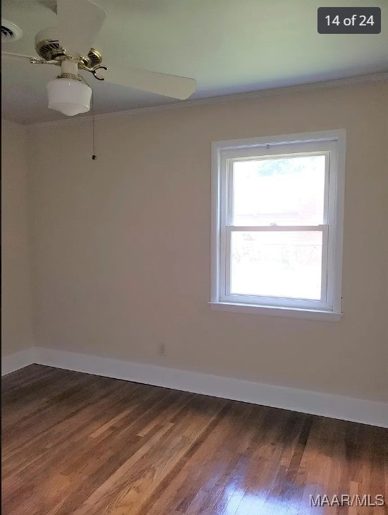 spare room featuring ornamental molding, hardwood / wood-style floors, and ceiling fan