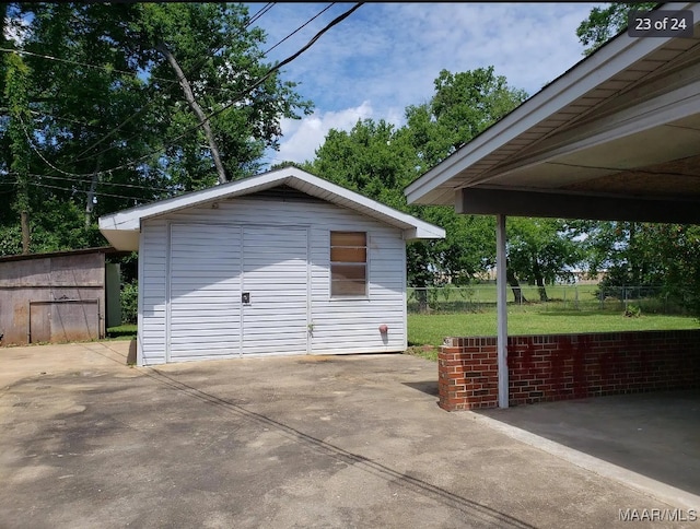 garage with a yard