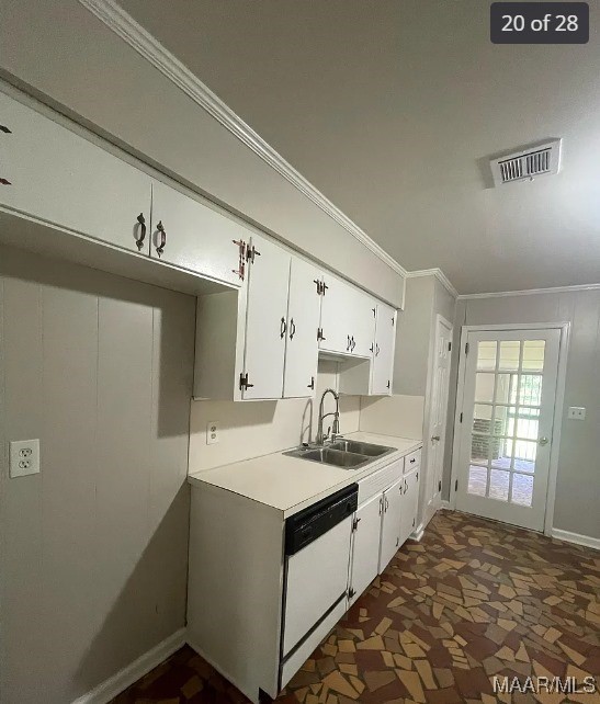 kitchen featuring ornamental molding, white dishwasher, sink, and white cabinetry