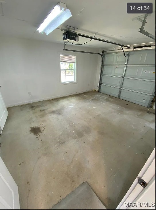 garage featuring a garage door opener