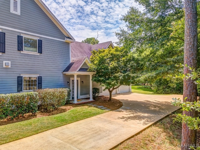 view of yard featuring a garage