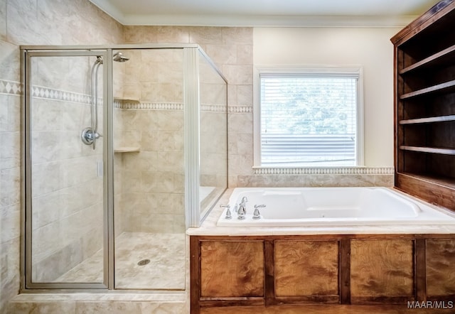 bathroom featuring independent shower and bath and ornamental molding