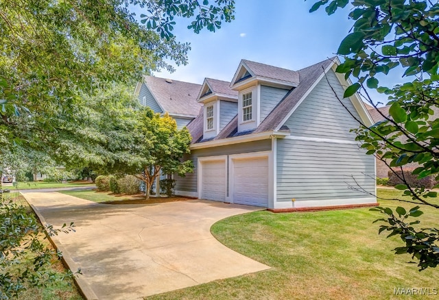 view of property exterior with a yard and a garage