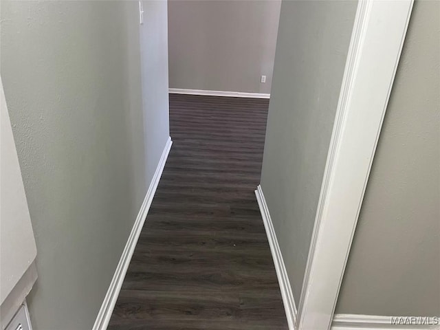 hall with dark hardwood / wood-style floors