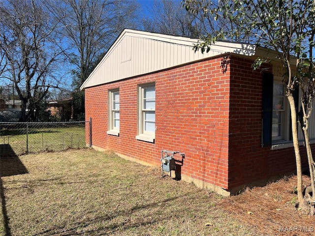 view of home's exterior featuring a lawn