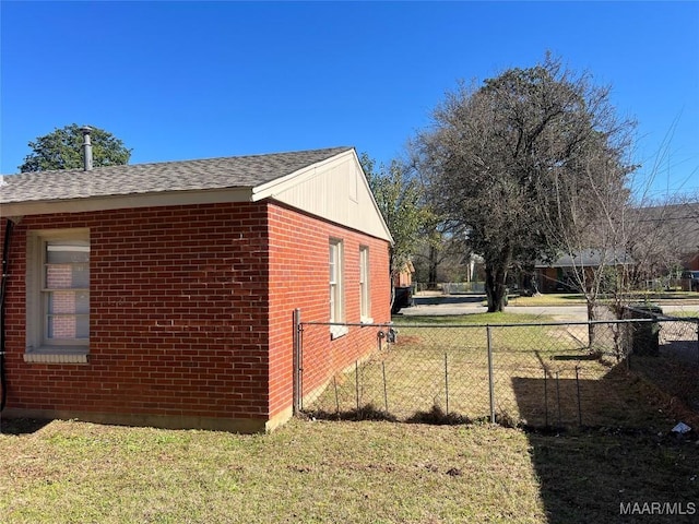 view of property exterior featuring a lawn