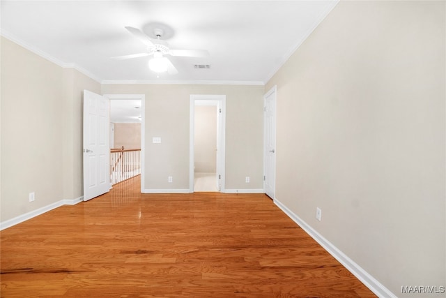 interior space with crown molding, light hardwood / wood-style flooring, and ceiling fan