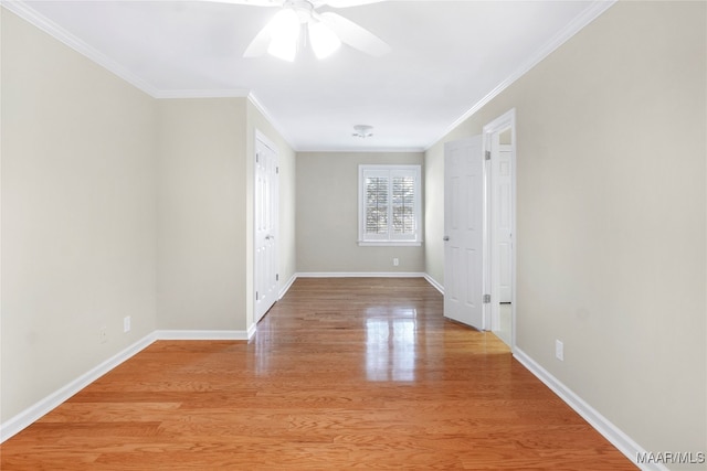 interior space featuring ceiling fan, crown molding, and light hardwood / wood-style flooring