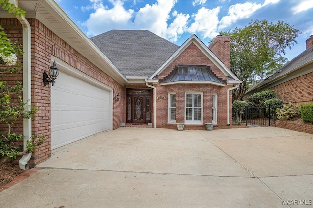 view of front of home with a garage