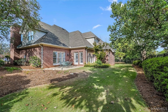 exterior space with a yard and a patio